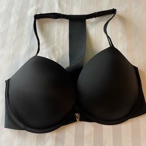 Two Victoria Secret bras size 34 D racer back front clasp.